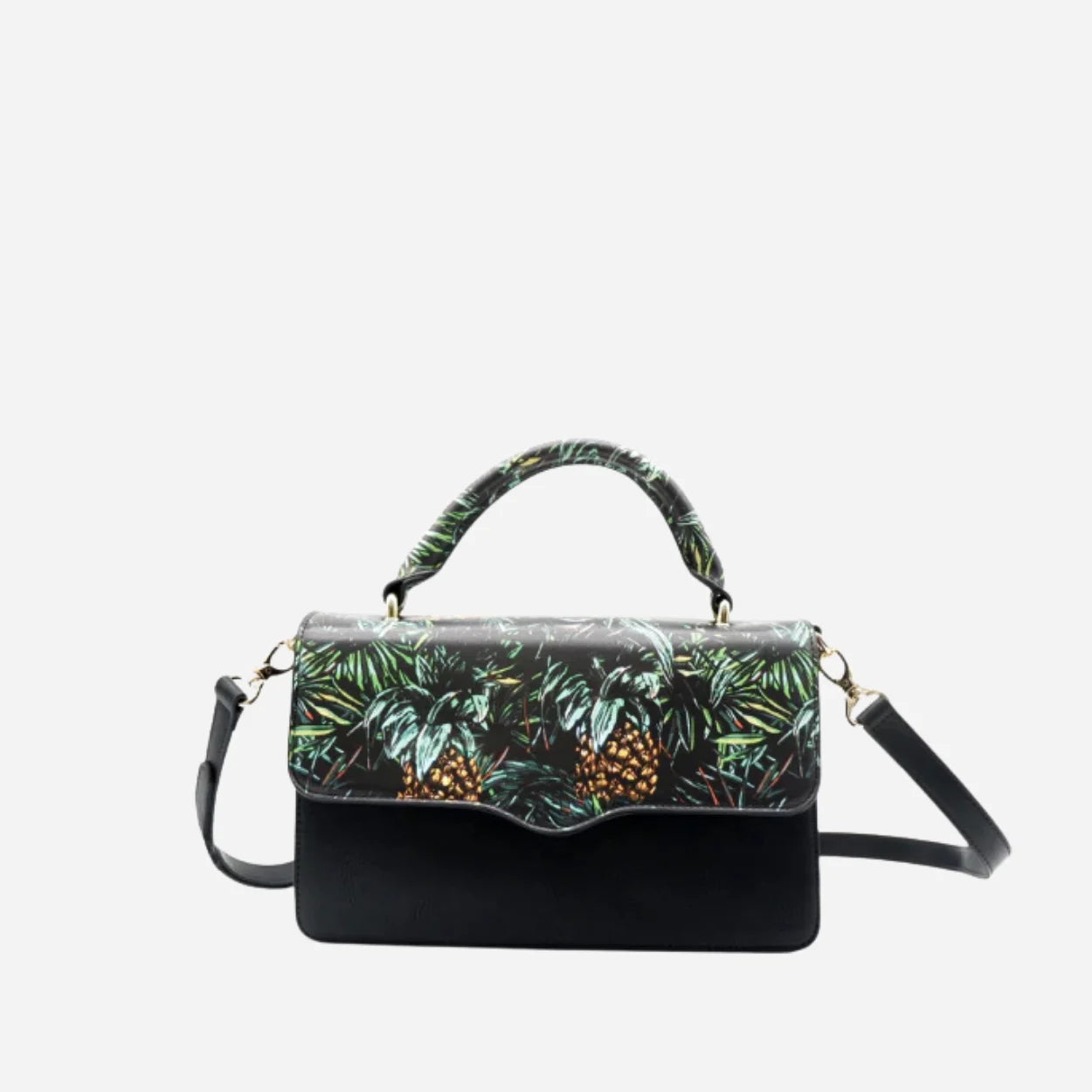Black handbag with tropical leaf pattern on a white background