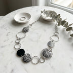 Lyra Monochrome Multi-Ring Statement Necklace - BeltNBags