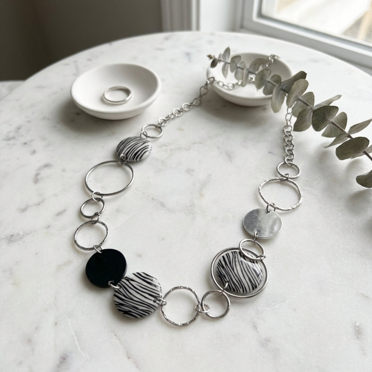 Lyra Monochrome Multi-Ring Statement Necklace - BeltNBags
